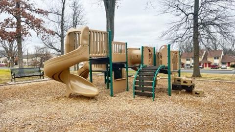 picture of the playground behind the community building